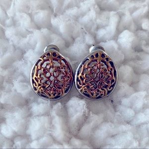 Beautiful two toned stainless steel studs.